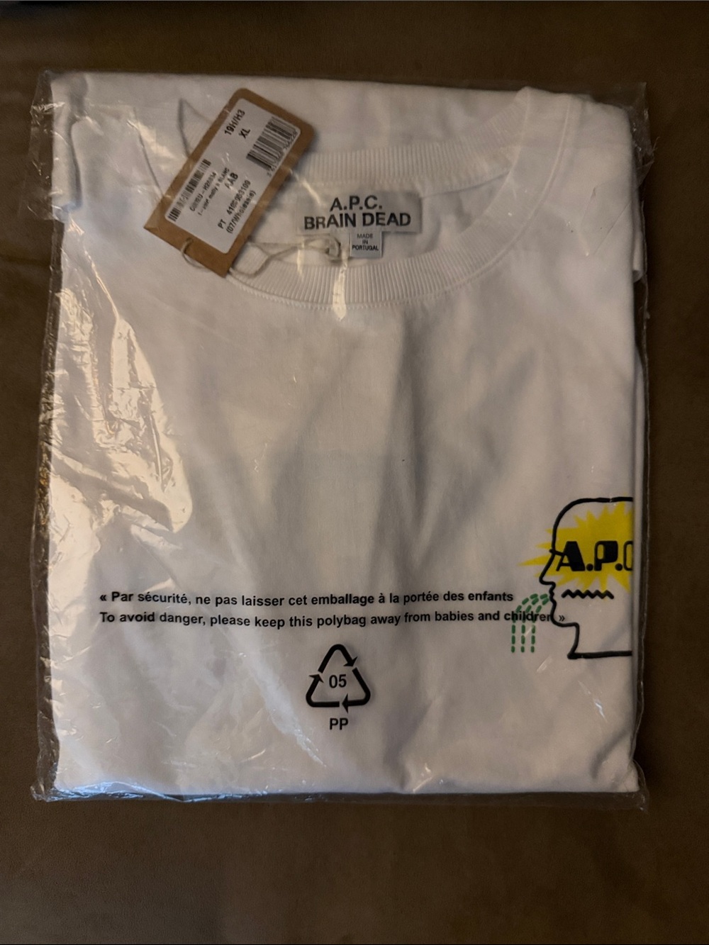 A.P.C. Brain Dead White Short-Sleeve Tee with Yellow Graphic on Pocket